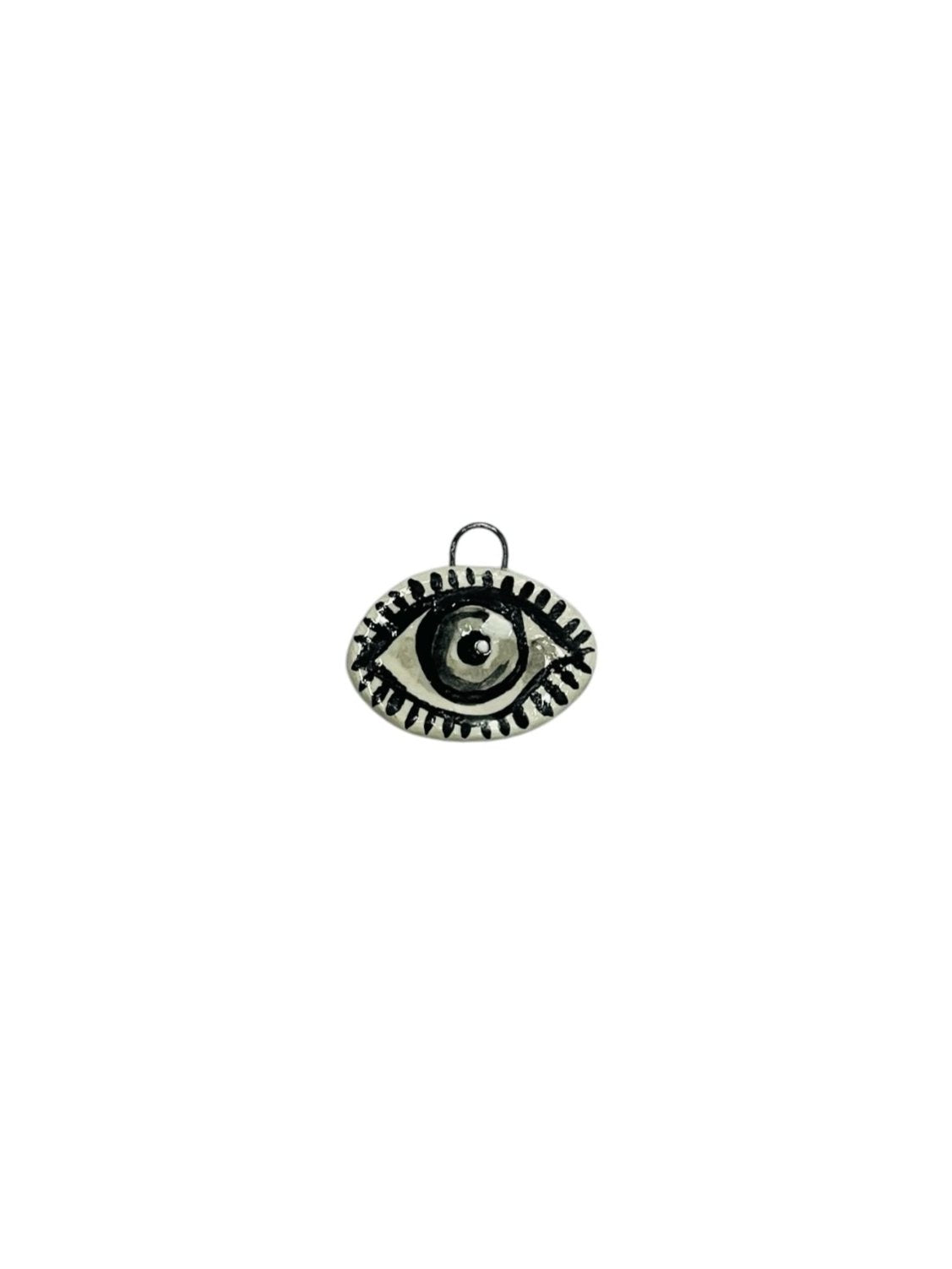 black and white eye ceramic charm