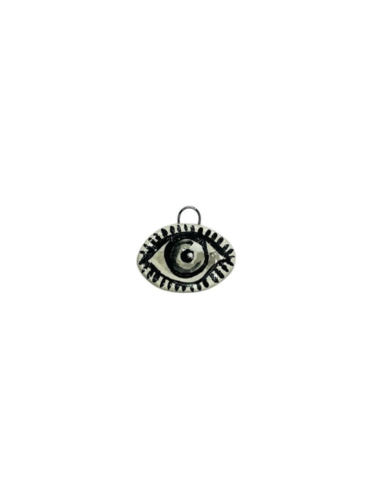 black and white eye ceramic charm