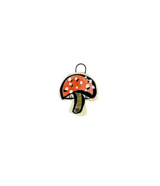 red mushroom ceramic charm